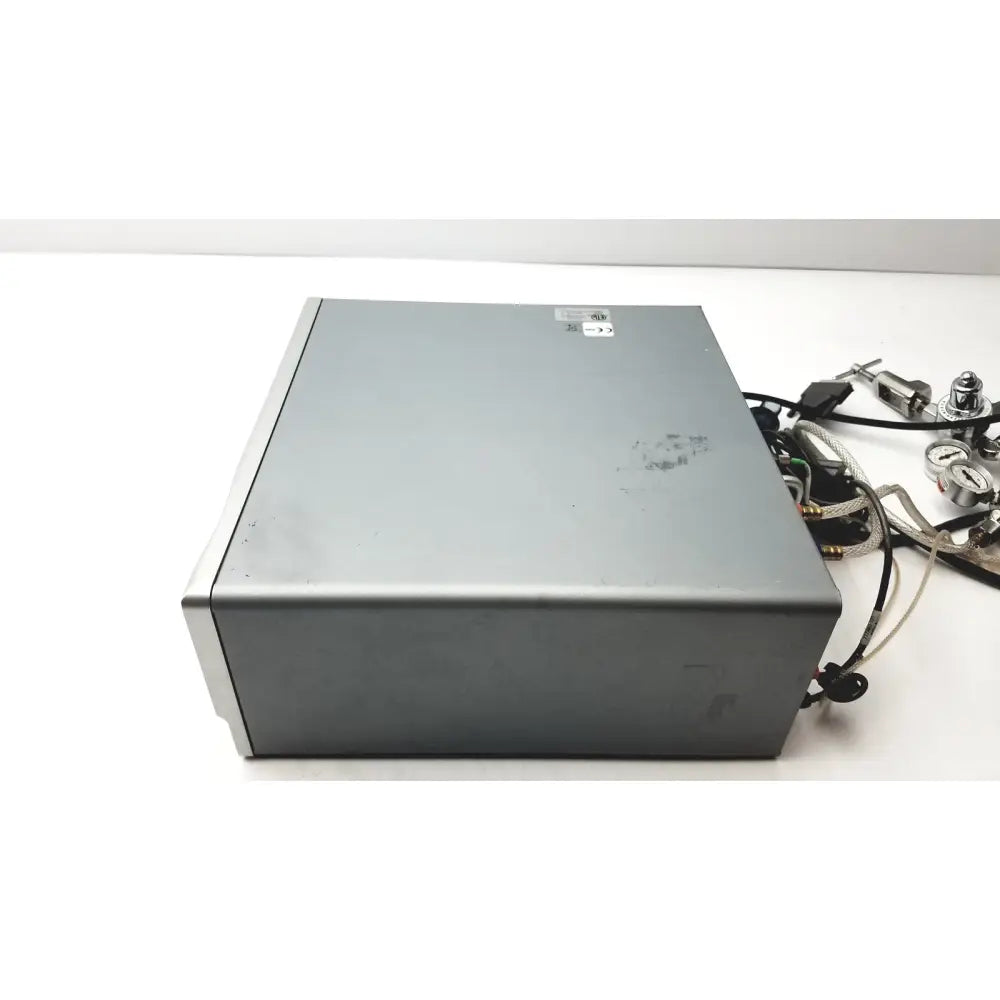 Silver metallic carefusion vmax encore analyzer with matte finish and visible cables connected to western medical regulators