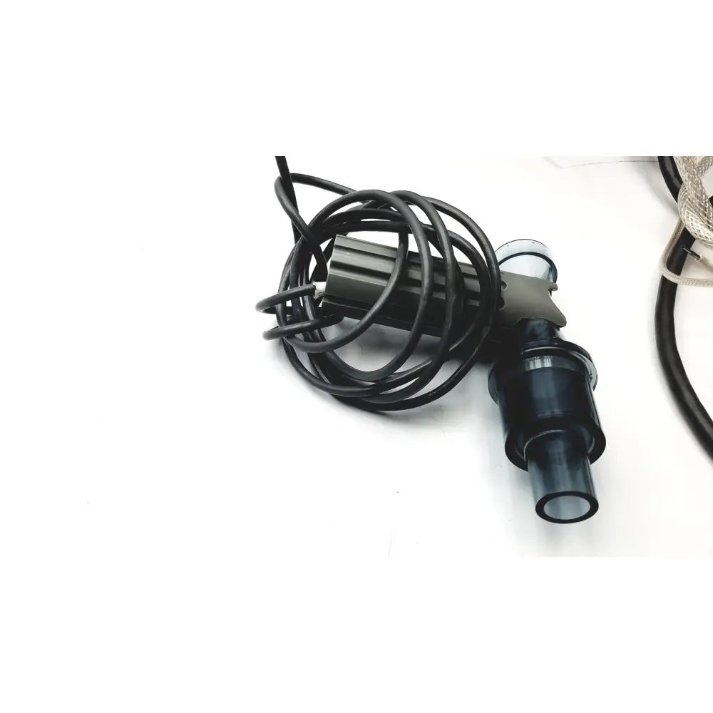 Black coiled cable with metallic cylindrical connector and transparent housing for carefusion vmax encore analyzer