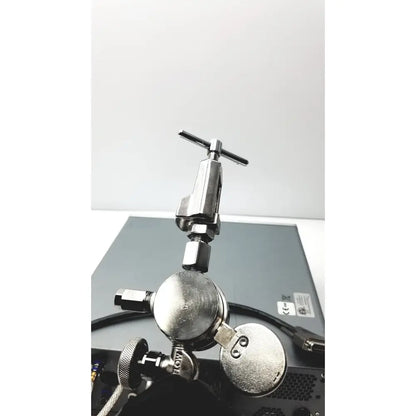 Silver metallic gas regulator with t-shaped handle and threaded connections for carefusion vmax encore analyzer