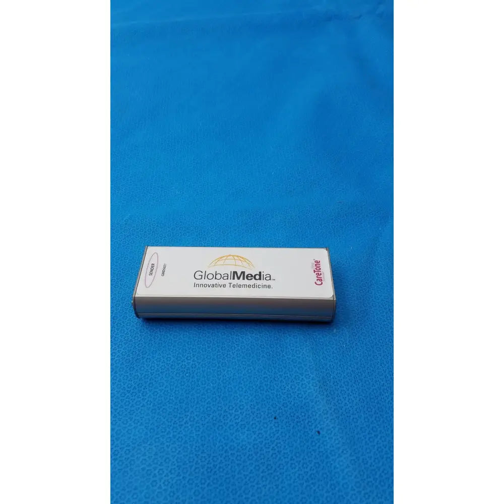 White rectangular box of caretone global medical innovative telemedicine sender gmd5021 with globalmedia branding and globe logo
