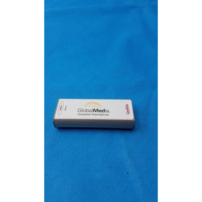 White rectangular box of caretone global medical innovative telemedicine sender gmd5021 with globalmedia branding and globe logo