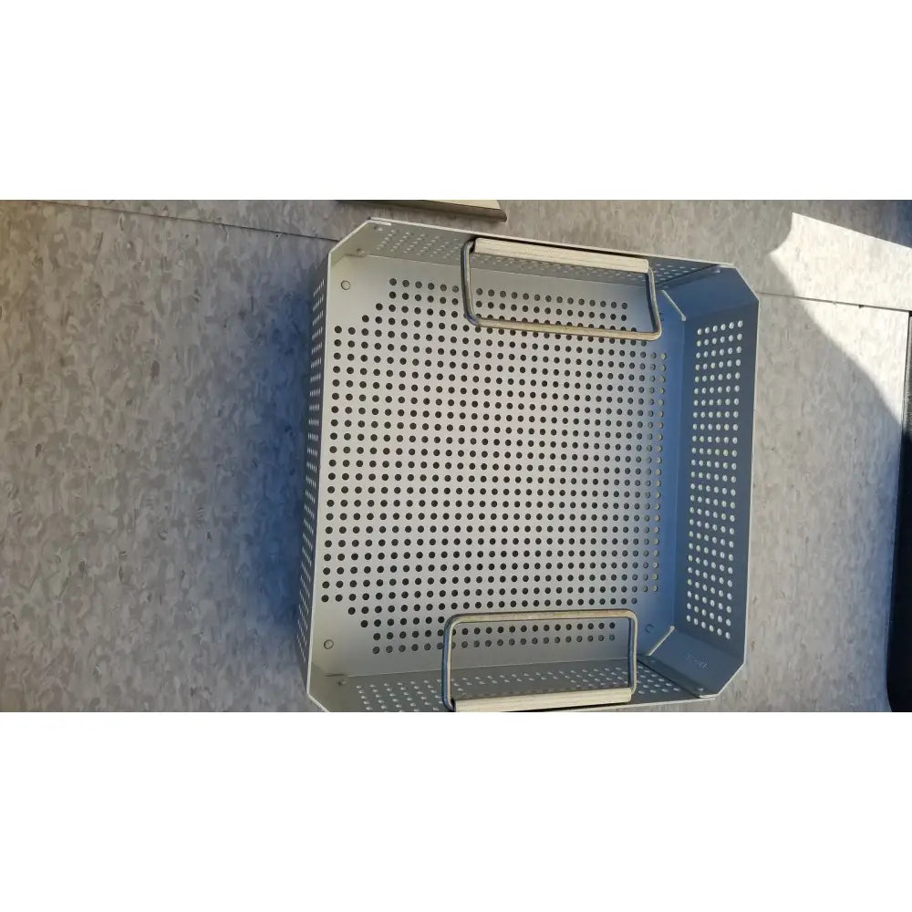 Silver perforated metal grill basket with handles for case medical half size sterilization case and lid