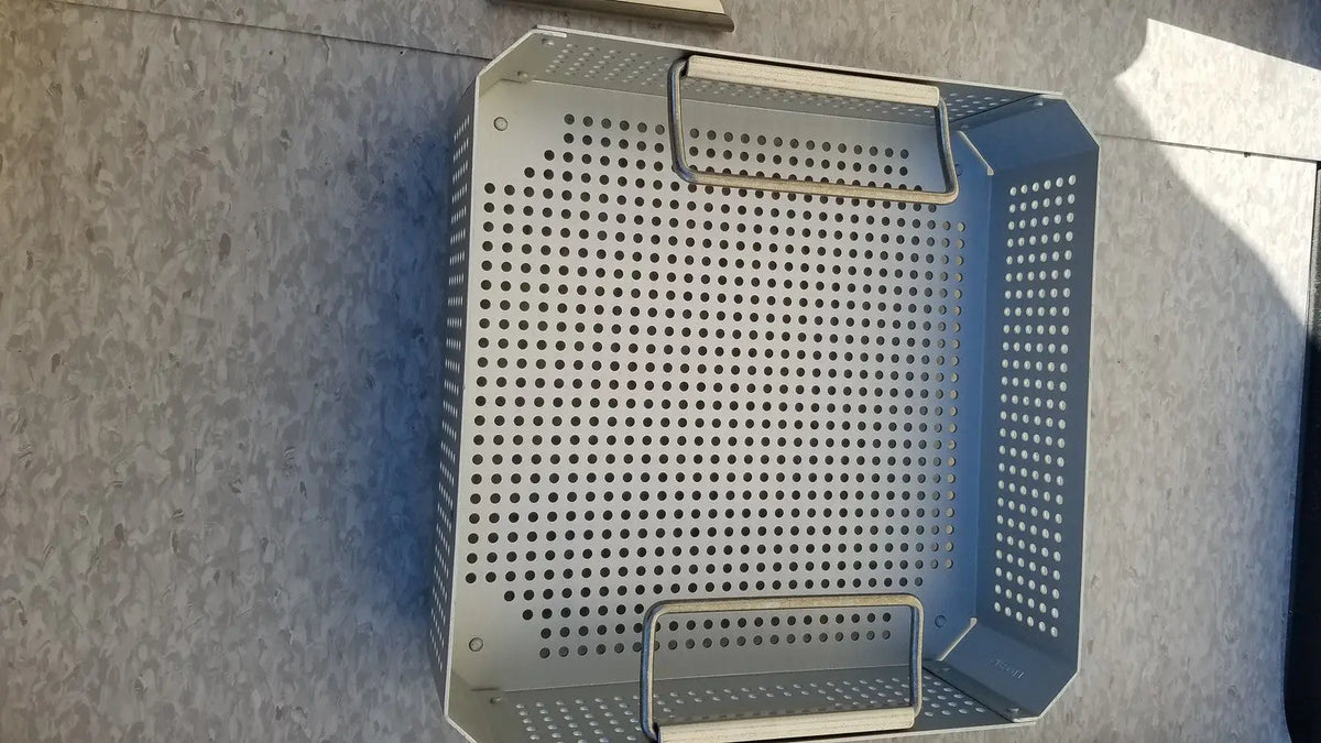 Silver perforated metal grill basket with handles for case medical half size sterilization case and lid