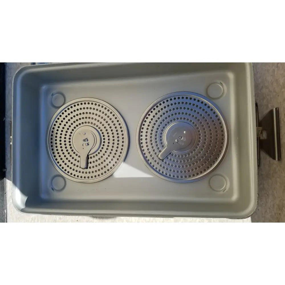 Gray plastic case medical karl storage and sterilization container with two circular perforated metal heating elements