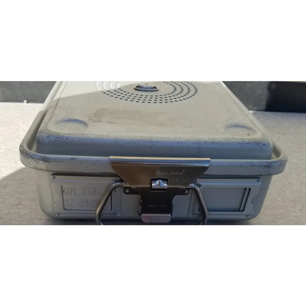 Gray metallic medical karl storz case medical storage and sterilization container with sturdy latch and handle
