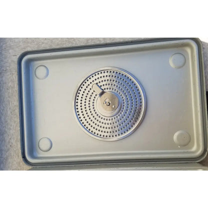 Silver perforated metal drip tray with central drain spout for case medical karl storz sterilization container