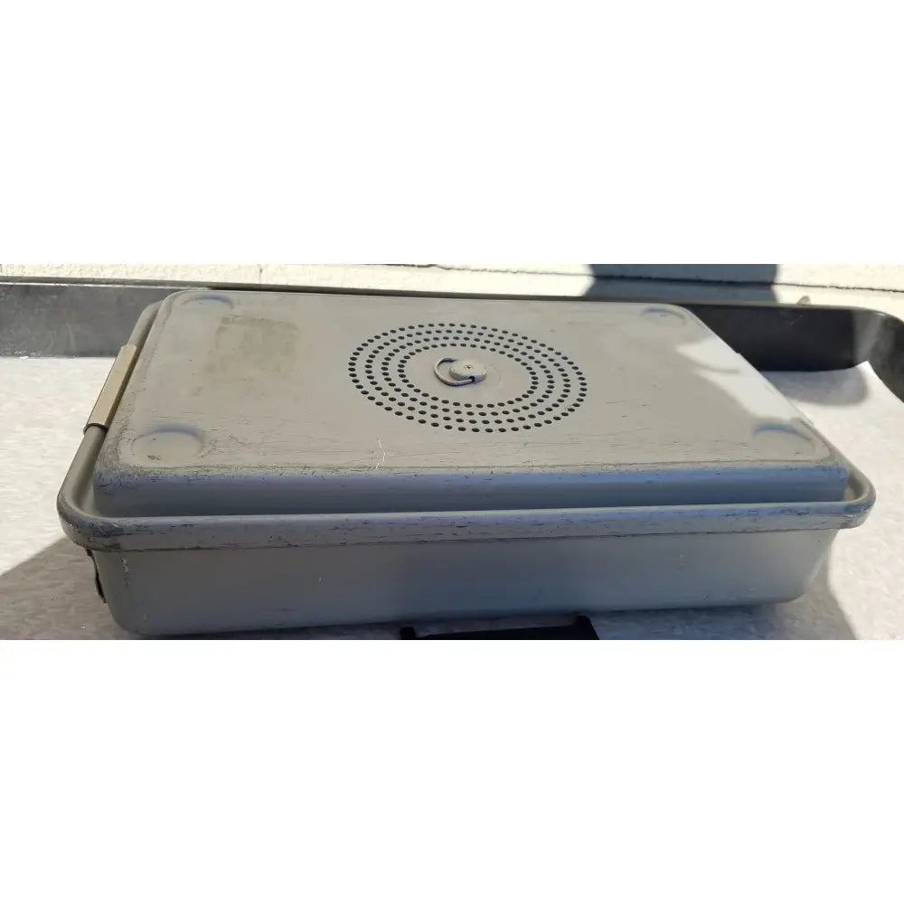 Gray plastic case medical karl storz storage and sterilization container with circular perforated lid and metal latch