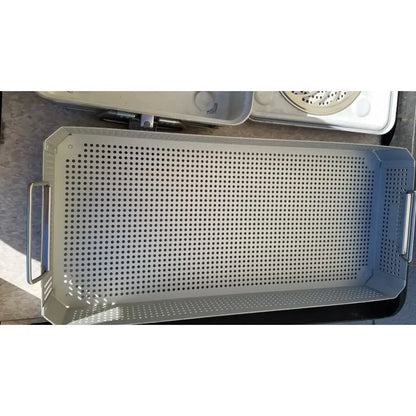 Silver perforated metal baking tray with reinforced handles in case medical karl storz ksz 39402as sterilization container