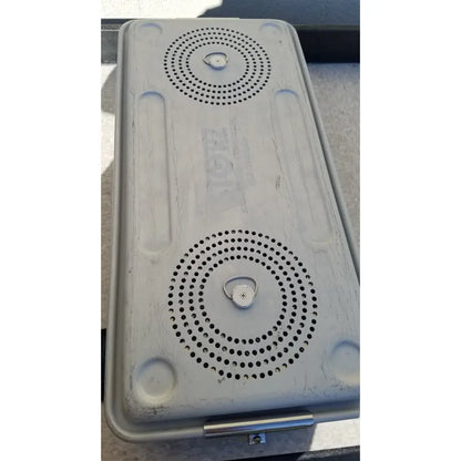 Gray plastic lid with circular perforations and metal handles for case medical karl storz ksz 39402as sterilization container