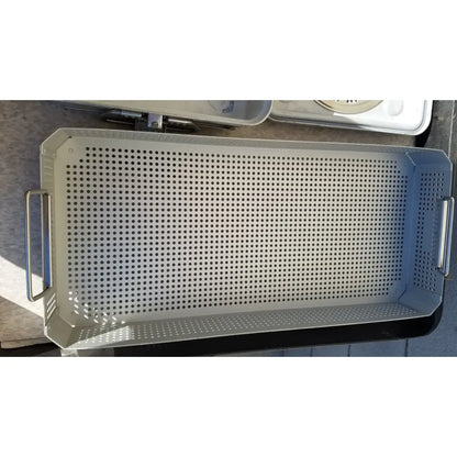 Silver perforated metal baking tray with reinforced handles and raised rim in case medical karl storz ksz 39402as container
