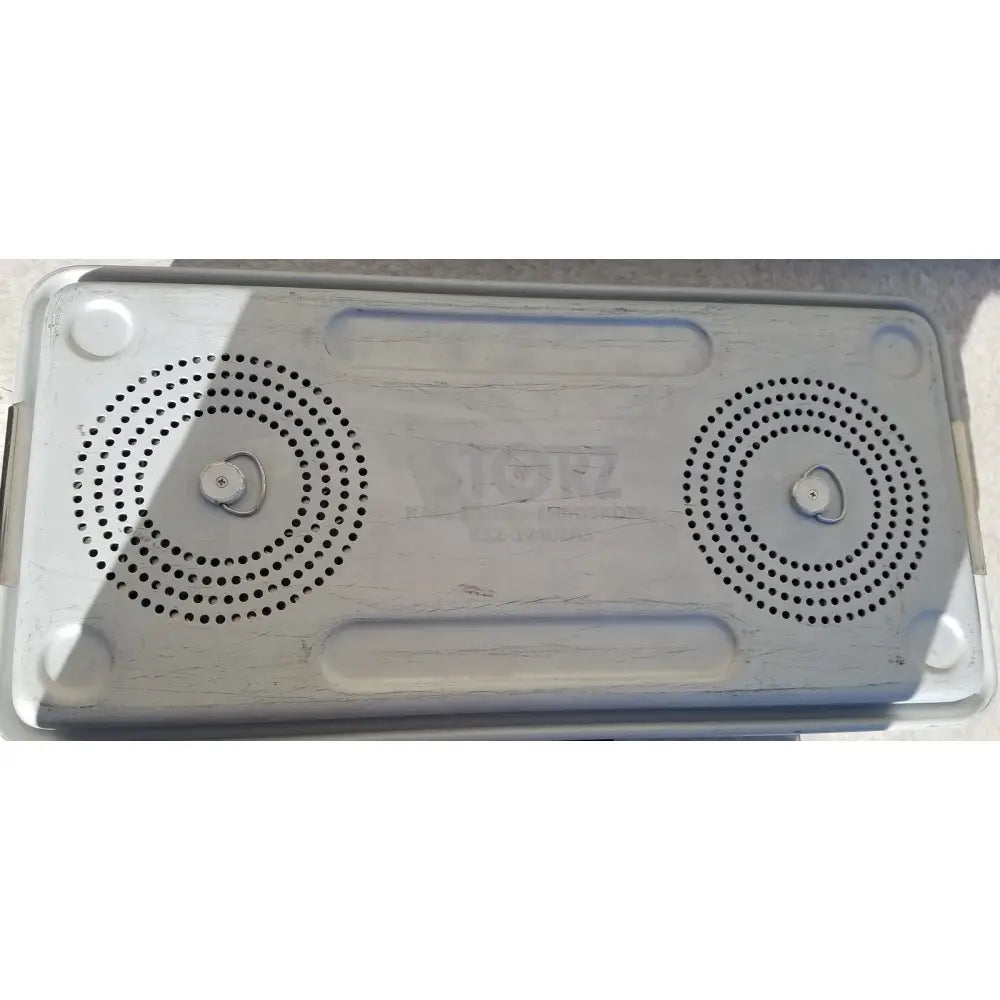 Silver plastic cooler lid with perforated speaker grilles and embossed logo for case medical karl Storz ksz 39402as container