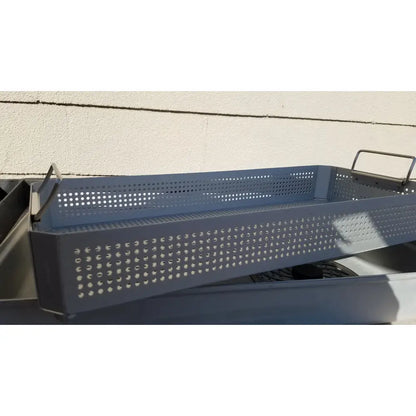 Gray perforated metal grilling tray with integrated handles for case medical karl storz ksz 39402as sterilization container