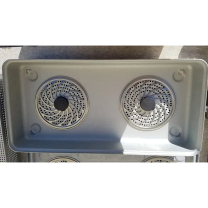 Gray plastic two-burner portable stove with spiral metal grates in case medical karl storz ksz 39402as container