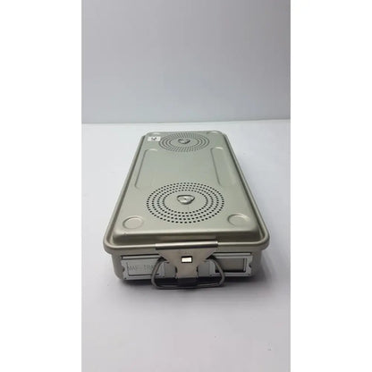 Silver metallic solid sterilization container case medical with sturdy handle and two circular perforated speaker grilles