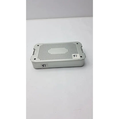 Silver metallic surgical instrument tray with perforated surface and reinforced corners in case medical mc02 solid brass container