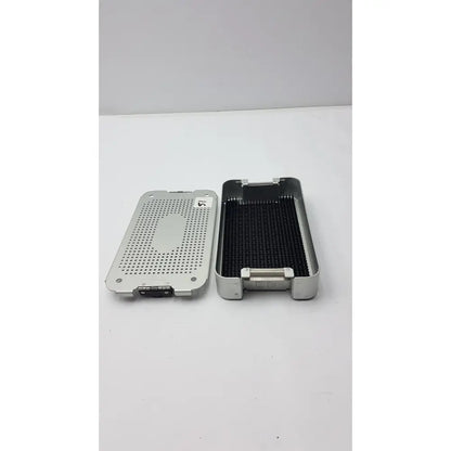 Silver metallic case medical mc02 solid brass sterilization container with perforated lid and black interior tray