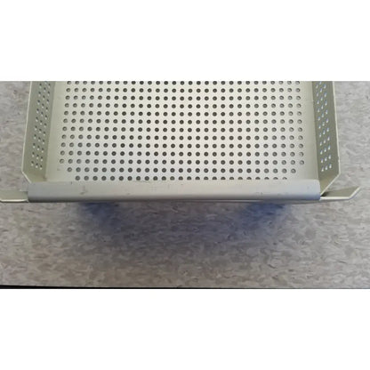 Case medical perforated aluminum tray with silver reinforced edges and evenly spaced holes for sterilization use