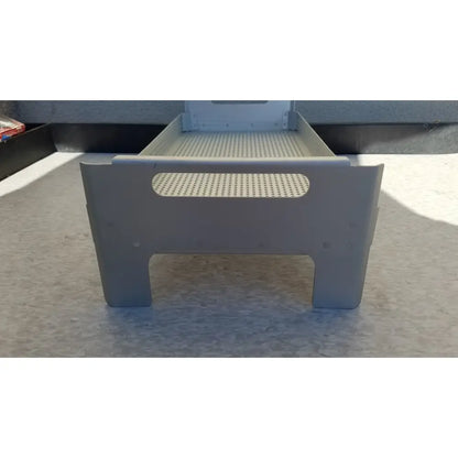 Gray plastic case medical perforated basket with perforated top surface and handle cutouts for sterilization use