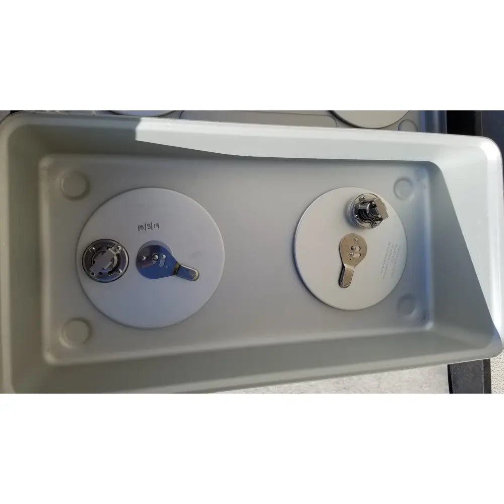 Gray plastic case medical storage container with two circular lids featuring metallic keyhole lock mechanisms