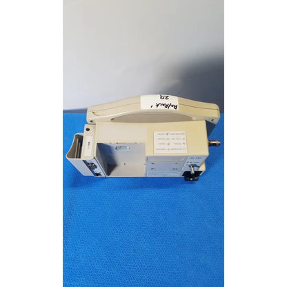 Beige casmed 740 masimo set spo2 blood pressure patient monitor with handle and control panel labeled pulmonar 29