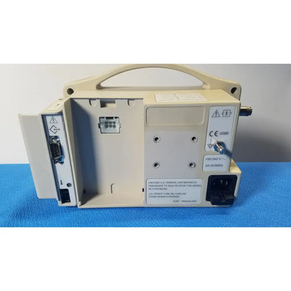 Beige casmed 740 masimo set spo2 blood pressure patient monitor back panel showing safety and electrical specifications
