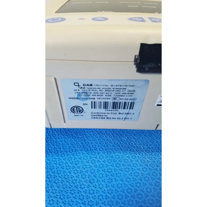 Beige casmed 740 masimo set spo2 blood pressure patient monitor with blue label showing model and serial number information