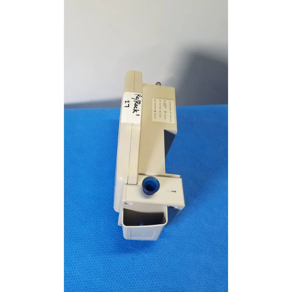 Beige plastic casmed 740 max nibp spo2 blood pressure device with blue cap labeled rippack 1 for spo2 blood pressure monitoring