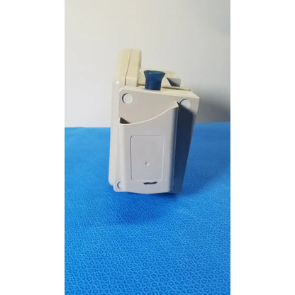 Beige plastic casmed 740 max nibp vital signs monitor with blue knob for accurate nibp vital measurement