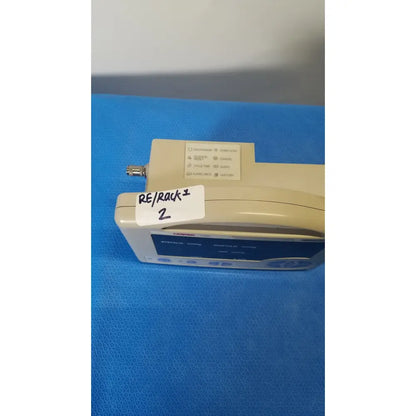 Beige casmed 740 max nibp vital signs monitor with blue display screen and control buttons for accurate monitoring