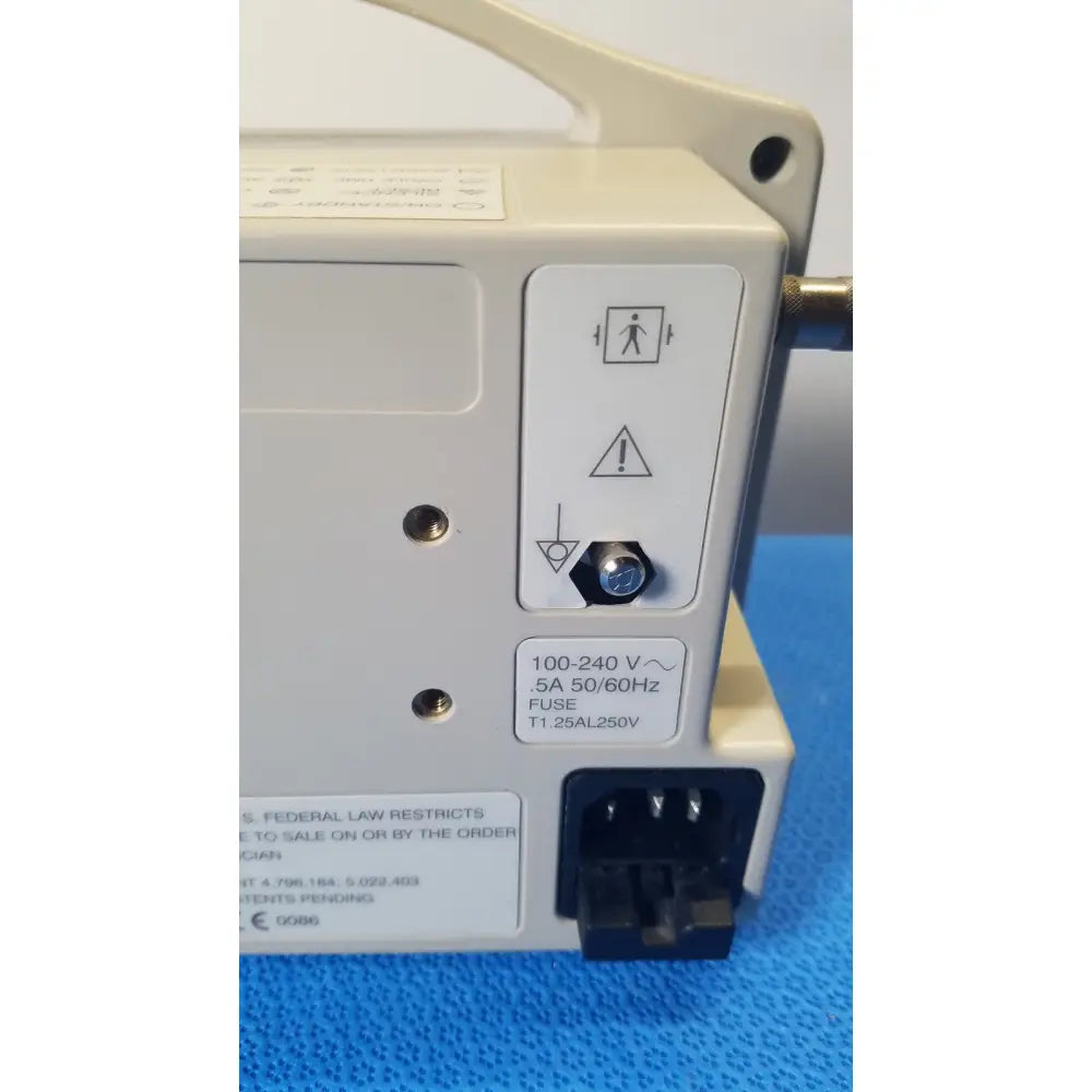 Beige casmed 740 patient monitor nibp spo2 masimo back panel with power input port fuse label and warning symbols