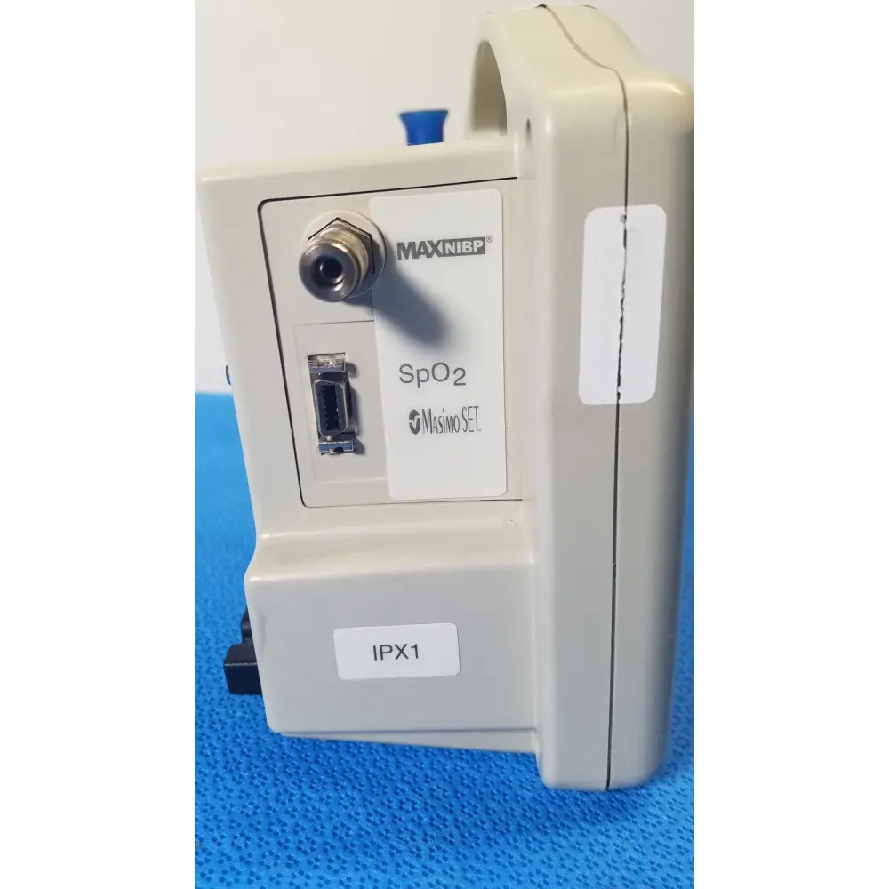 Beige casmed 740 patient monitor nibp spo2 with metallic connector usb port and masimo set label on side panel