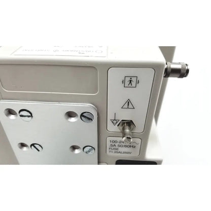White casmed 740 patient monitor spo2 with metallic fuse and warning symbols on panel for medical use