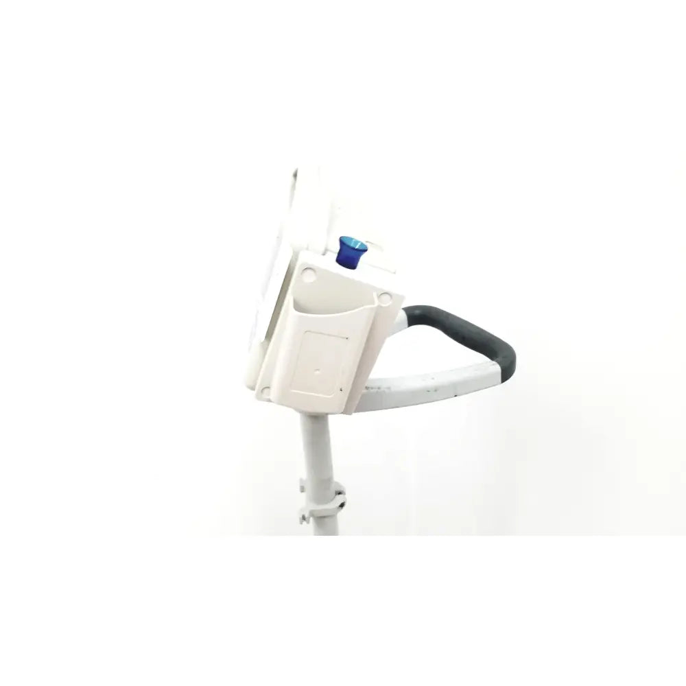CasMed 740 patient monitor spo2 with rolling stand showing white plastic lawn edger with black handle and blue adjustment knob