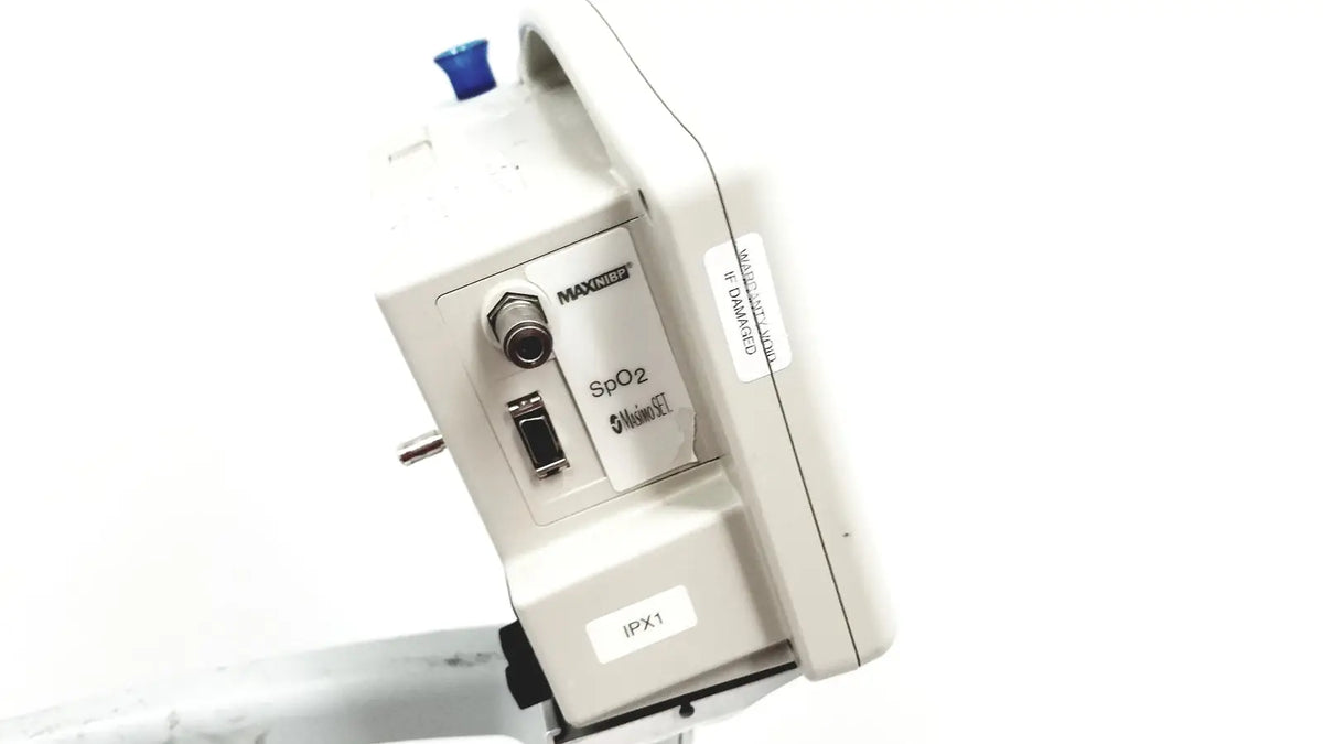White casmed 740 patient monitor spo2 with blue button and labeled ports on rolling stand for medical use