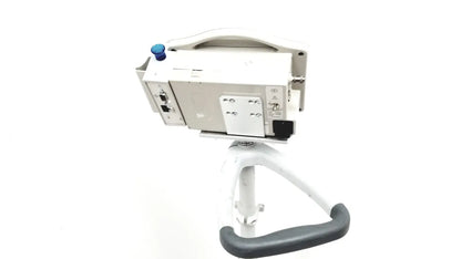 White casmed 740 patient monitor spo2 mounted on adjustable stand with gray ergonomic handle for medical use