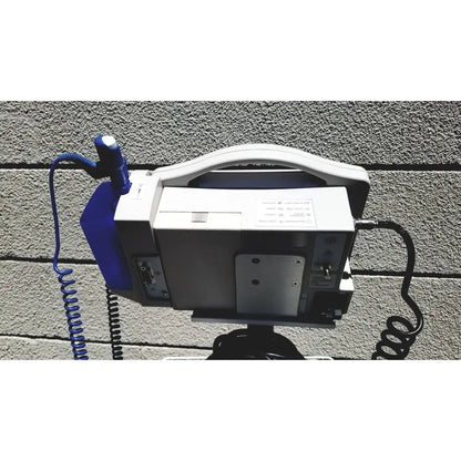 White and blue portable defibrillator with coiled cable for vital signs monitor casmed 740 with rolling stand lot of 3