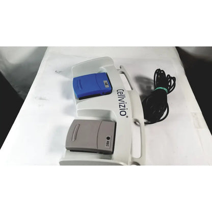 White Cellvizio foot pedal medical device with blue and gray components featuring rec label for reuse medical purposes