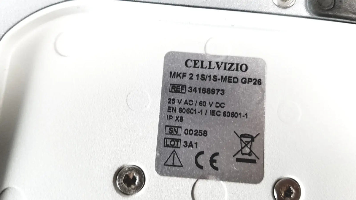Silver metallic label with black text on the back of the cellvizio foot pedal showing model 34168973 details