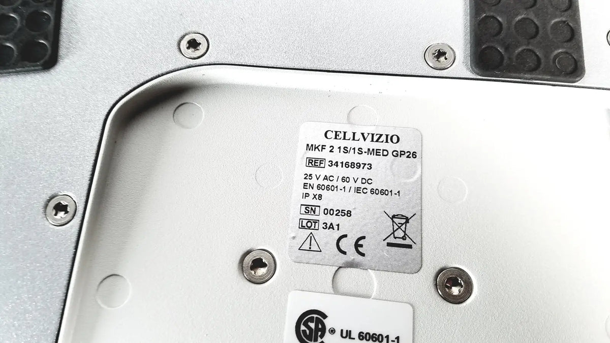 Silver metallic cellvizio foot pedal mkf 21s smed gp26 device label with black text and reuse medical certifications