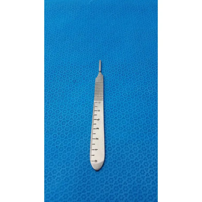 Silver centurion pakistan scalpel handle featuring a ruler etched scale along the metallic pakistan scalpel handle