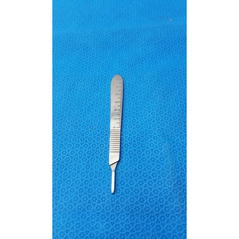 Silver stainless steel centurion pakistan scalpel handle with ruler scale and textured grip for precise surgical use