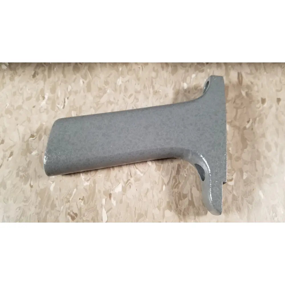 Gray metallic handle with textured matte finish and two circular cutouts on chaltilon csd200 dynamometer reuse medical device
