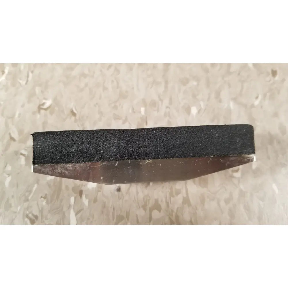 Black abrasive sanding block with metallic base for chaltilon csd200 dynamometer reuse medical applications