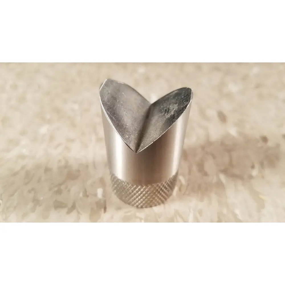 Silver heart-shaped piping tip with textured knurled base featured in chaltilon csd200 dynamometer product image