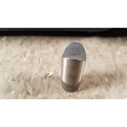 Silver-toned metal chaltilon csd200 dynamometer with textured knurled base and flat worn top for reuse medical applications