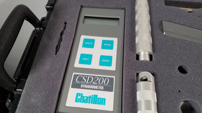 Gray chaltilon csd200 dynamometer with digital display and teal buttons in black case with metallic probes