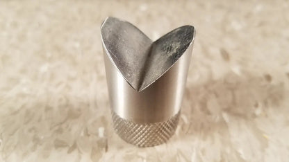 Silver heart-shaped piping tip with textured knurled base featured in chaltilon csd200 dynamometer product image