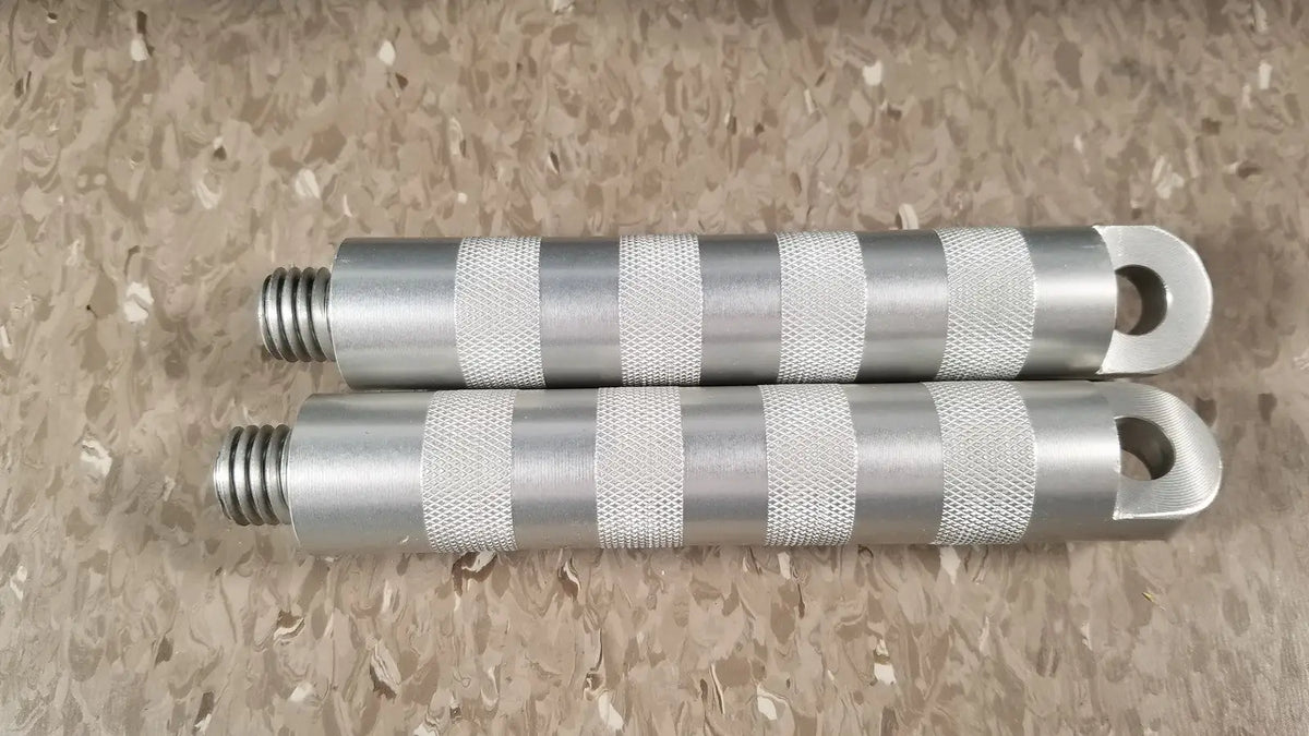 Silver metallic handle grips with textured knurled sections and threaded ends for chaltilon csd200 dynamometer reuse medical use