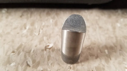 Silver-toned metal chaltilon csd200 dynamometer with textured knurled base and flat worn top for reuse medical applications
