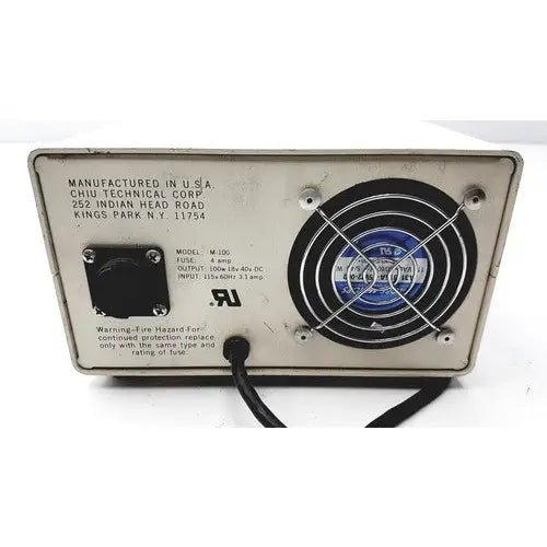 Beige metal power supply unit with circular fan and black cable by chiu technical corporation mercury 100w model m-100t
